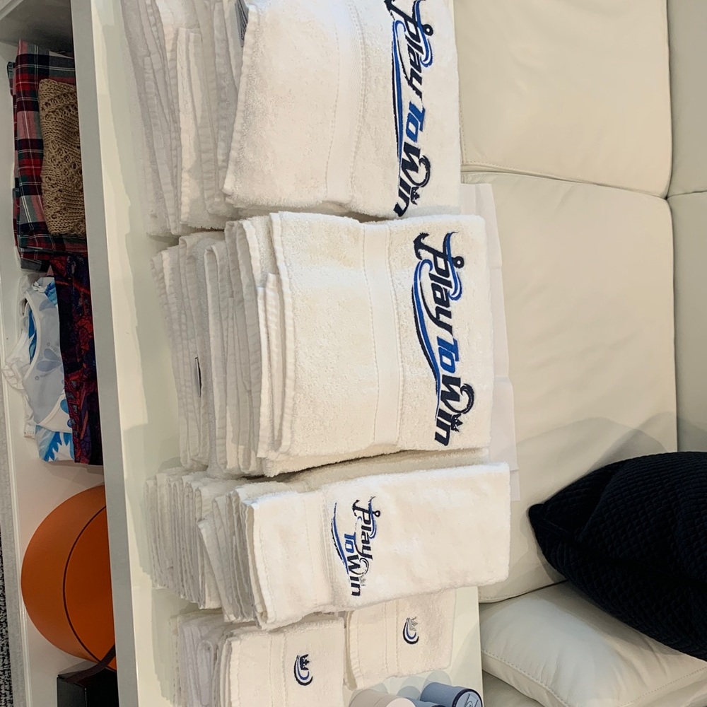 White Embroidered Towels with Blue Logo. Large set!!  Great condition